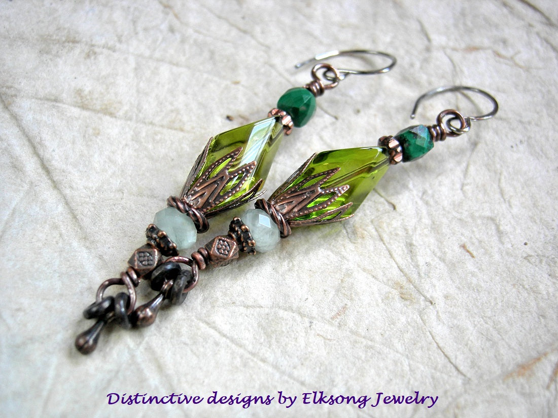 Sea green vintage glass & gemstone earrings with antiqued copper caps & beads. Rhodium ear wires. 