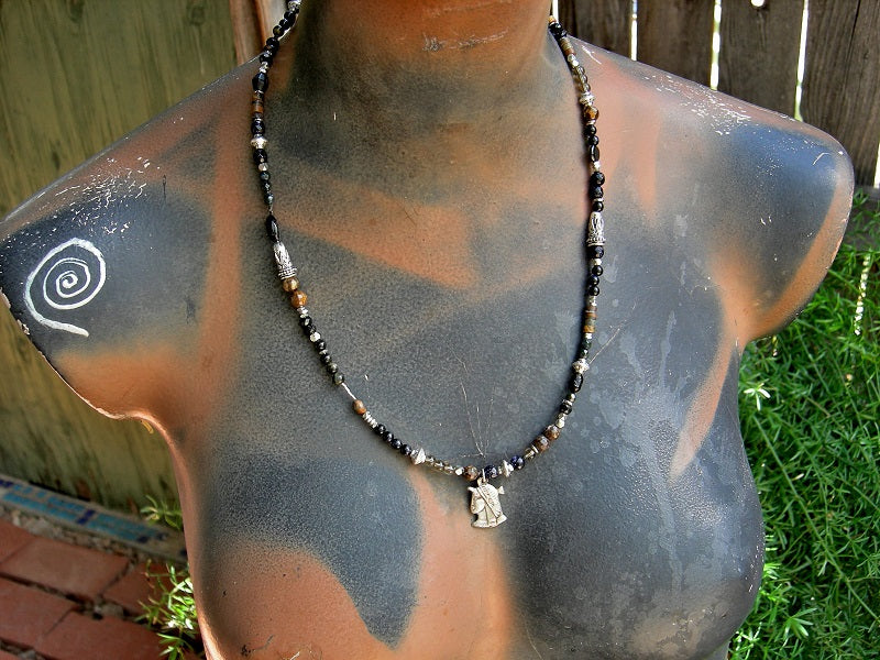 Dark Isis strung bead necklace with black & brown gemstone, glass & silver beads. Vintage sterling silver Egyptian charm. 