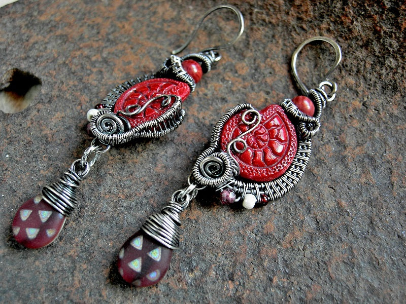 Red glass nautilus earrings with pressed Czech glass beads, vintage coral rounds, faceted garnet, matte glass teardrops & sterling wire wrap. 