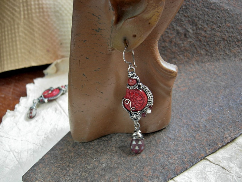 Scarlet nautilus earrings with pressed Czech glass beads, vintage coral rounds, faceted garnet, matte glass teardrops & sterling wire wrap. 