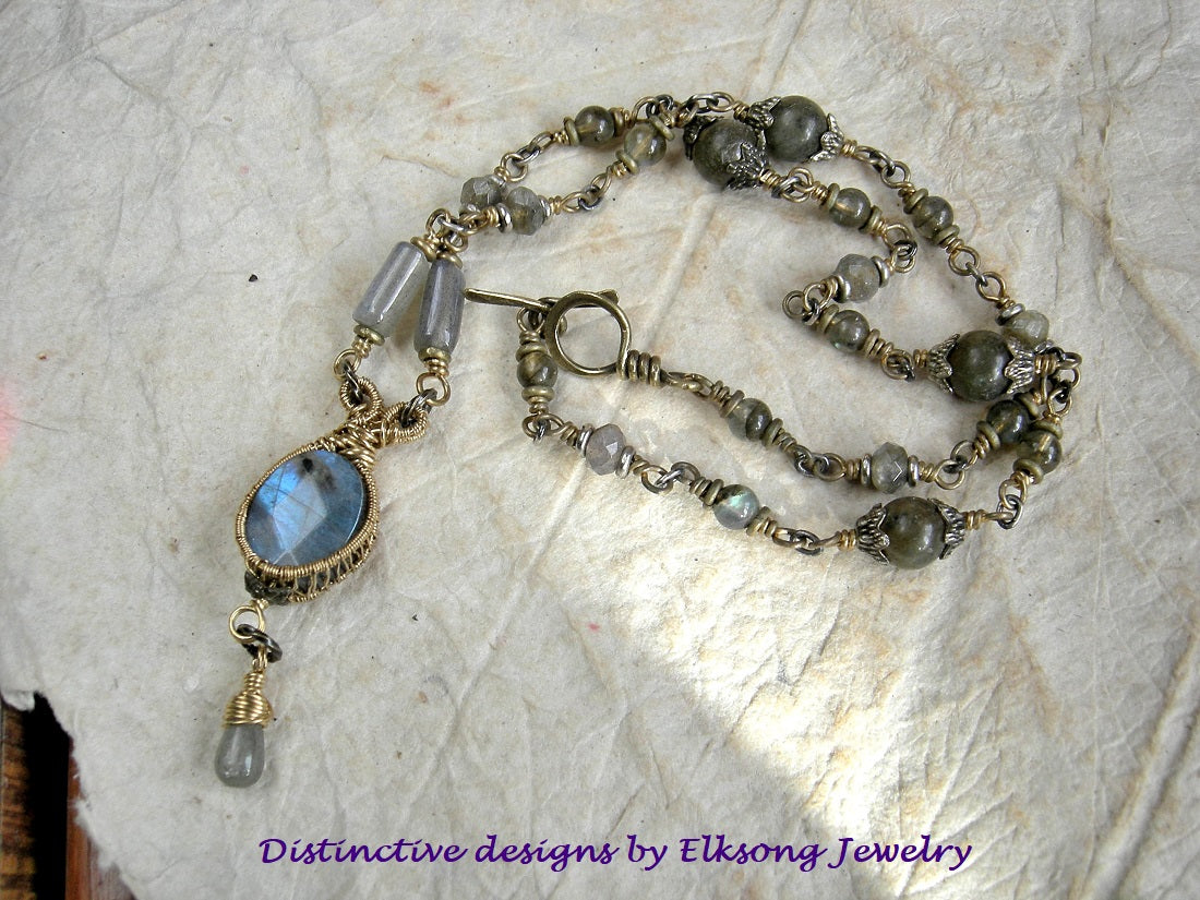 Glowing labradorite & golden brass wire wrap necklace with wire wrapped links & hand made toggle clasp. 