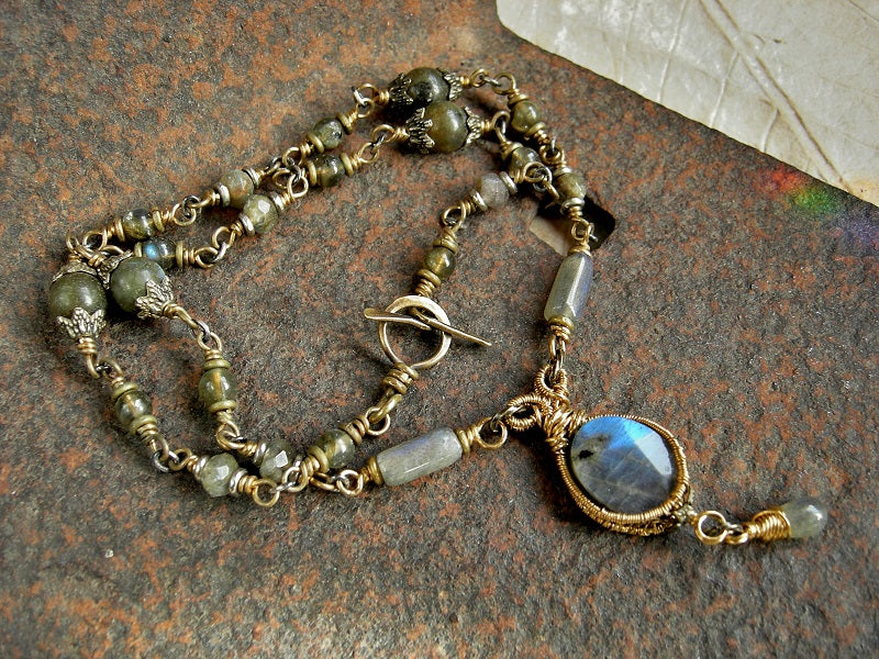 Flashy blue labradorite & golden brass wire wrap necklace with wire wrapped links & hand made toggle clasp. 