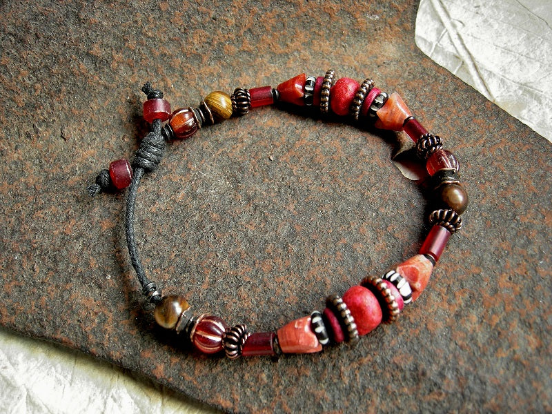 Sliding knot, adjustable boho bracelet with tiger eye, red onyx, orange Czech glass beads, red African glass & copper. 