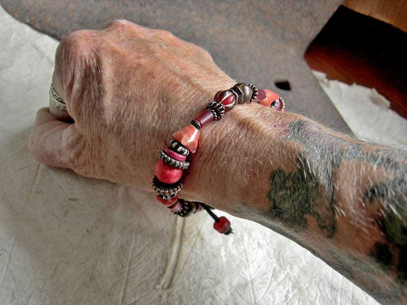 Boho unisex adjustable sliding knot bracelet with tiger eye, red onyx, orange Czech glass beads, red African glass & copper. 