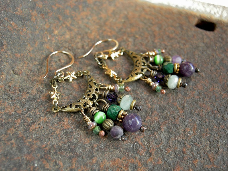 Lush chandelier earrings with purple & green stone, glass & brass beads. Crescent moon & star connectors, 14kt gold ear wires. 