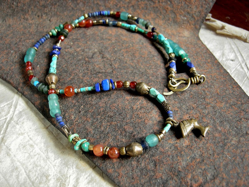 Colorful wrap bracelet/necklace with turquoise, lapis & carnelian, vintage & ancient glass, brass Nefetari charm, beads & spacers. 