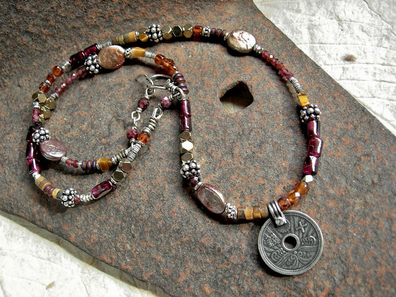 Wrap around bracelet or necklace with orange & red garnet, golden pyrite, tiger eye, freshwater pearl , silver coin focal & details, handmade toggle clasp. 