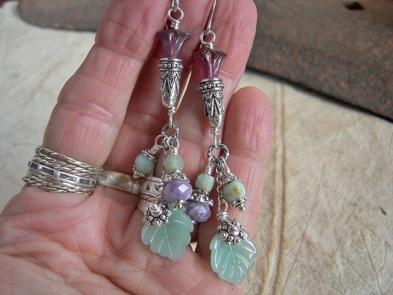 Elegant long drop earrings with purple & green gemstone & glass flower & leaf beads, antiqued silver caps & chain. 
