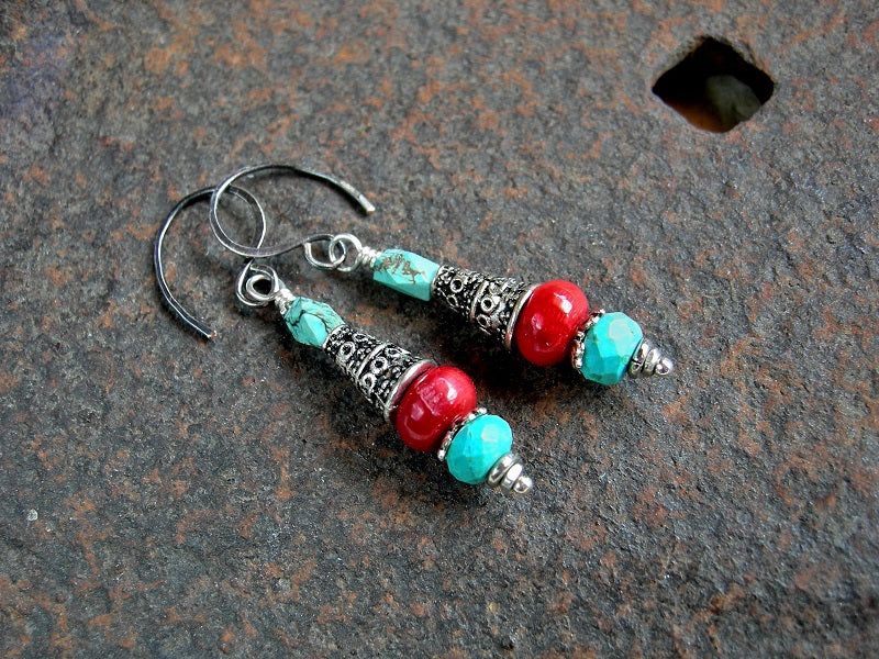 Bead stack style gemstone drop earrings with coral, genuine turquoise & silver finish cone caps. Sterling ear wires. 