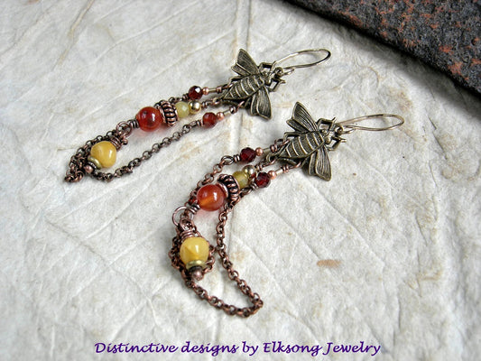 Sun & Honey earrings, chandelier style with brass Art Nouveau bees, amber, carnelian & copper chain. 