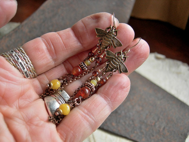 Chandelier style earrings  with brass Art Nouveau bees, amber, carnelian & copper chain. 