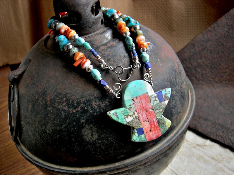 Colorful Thunder Bird necklace with hand cut focal of various turquoises, spiny oyster shell & lapis, strung with same beads & sterling silver bench beads. 