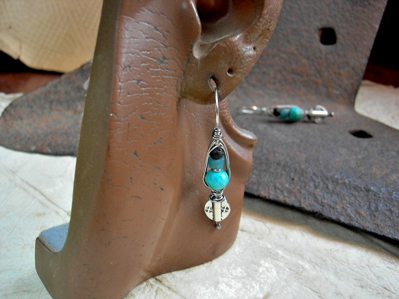 Urban boho wrapped hook earrings with turquoise, Java glass, black lava stone & oxidized sterling wire wrap. 