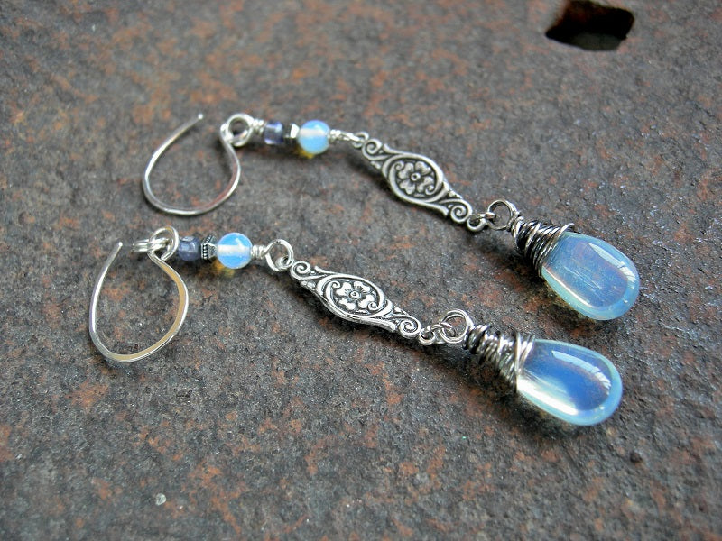 Long drop earrings with opalite drops & rounds, faceted iolite cubes & antiqued silver, Edwardian style  floral connectors. 