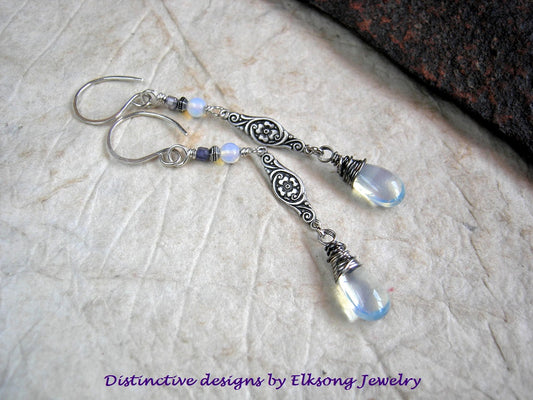 Elegant Edwardian earrings with opalite drops & rounds, faceted iolite cubes & antiqued silver floral connectors. 