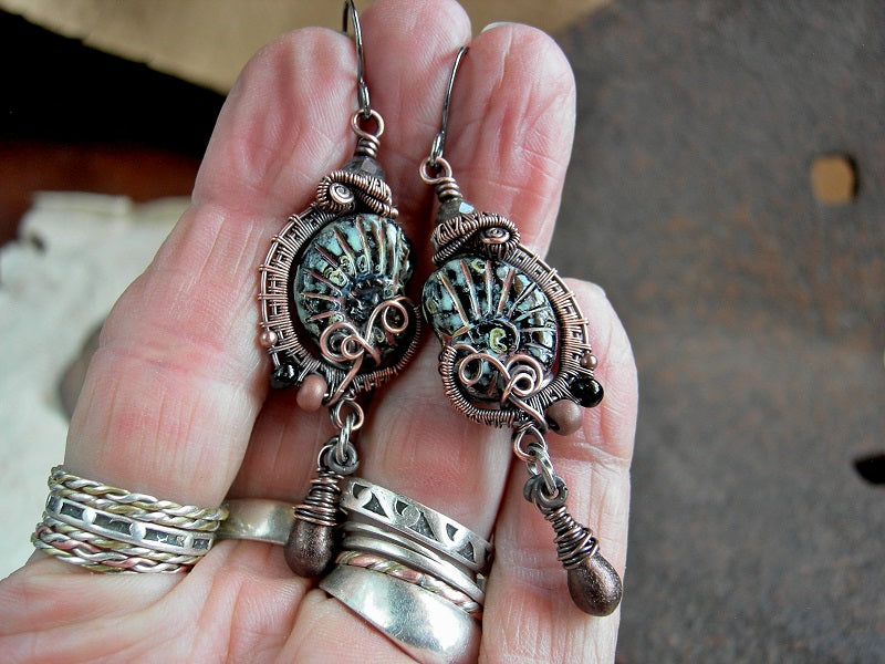 Boho luxe black glass nautilus earrings with copper wire wrap, glass seed beads & drops and faceted black toumalinated quartz rounds. 