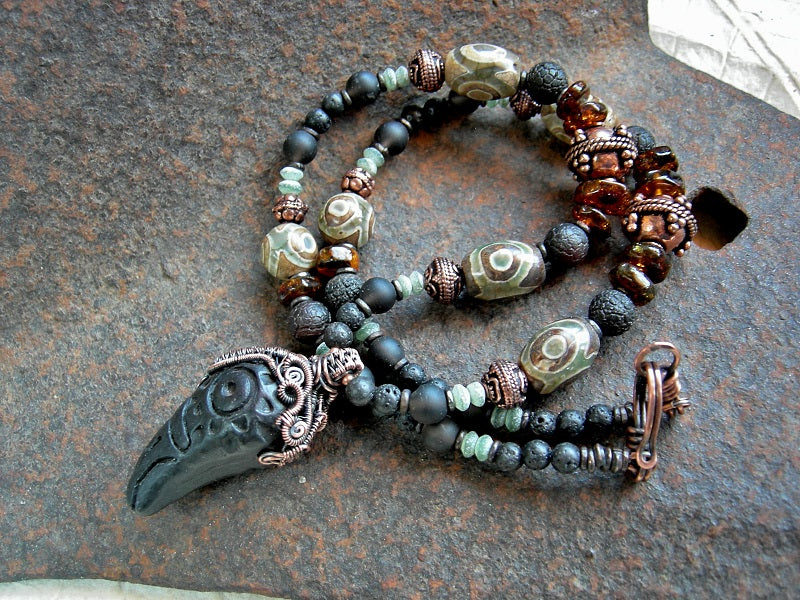 Unisex necklace with black clay raven head  & copper wire wrap focal, dark mix of gemstone & copper strung bead necklace. 