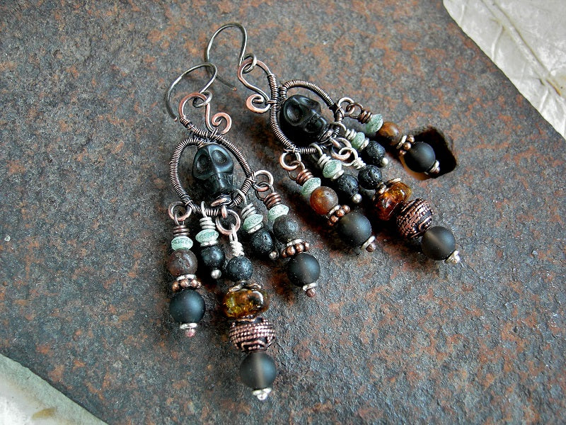 Dark Watcher chandelier earrings, hand formed copper wire wrap hanger, black sugar skulls, dark gemstone beads. 