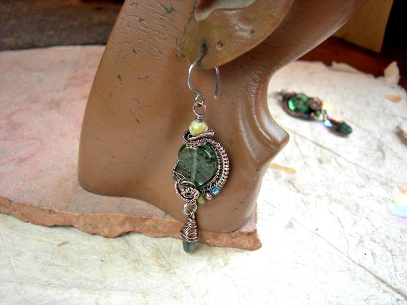 Green pressed glass nautilus bead earrings with copper wire wrap, chysoprase, apatite, sterling ear wires. 