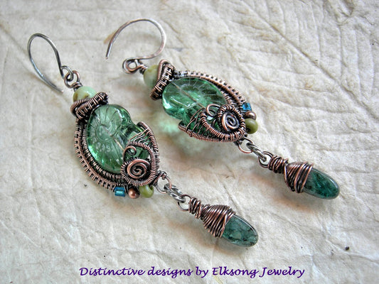 Sea green nautilus earrings with glass & gemstone beads, copper wire wrapping & hand made sterling ear wires. 