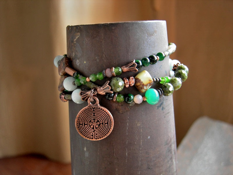 Asymmetrical wrap bracelet or necklace with mixed green gemstone, glass & copper beads, copper maze charm & handmade toggle clasp. 