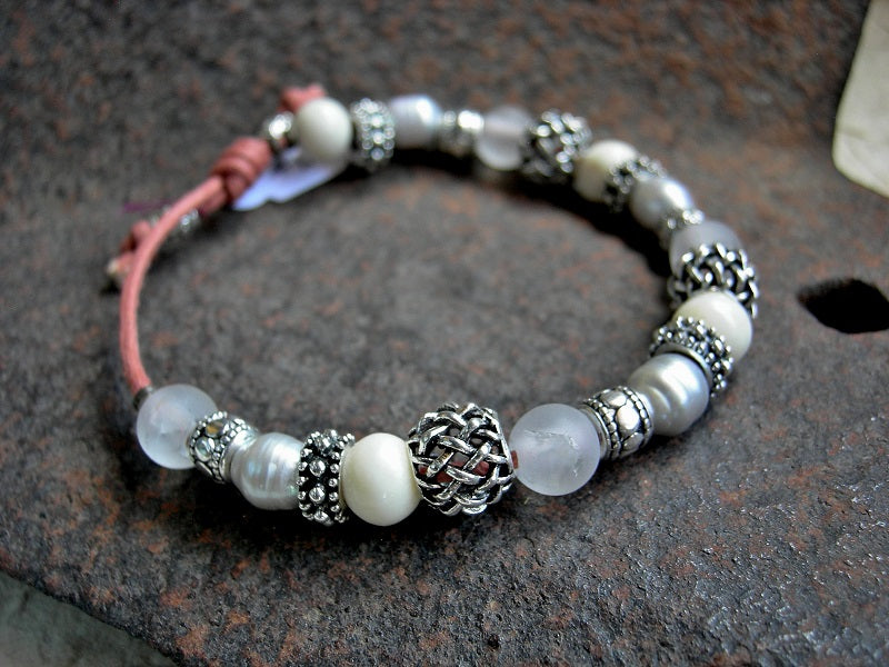 Winter white sliding knot bracelet with pearl, quartz, bone & silver beads. 