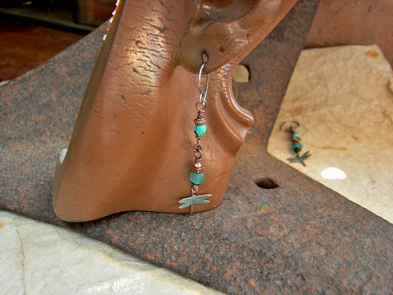 Drop earrings with faceted turquoise, copper & aqua Java glass beads, copper verdigris dragonfly charms, handmade sterling ear wires. 