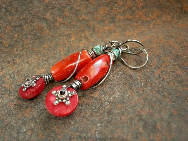 Rich red coral boho earrings with sterling wire wrap, faceted turquoise cube beads & silver finish Bali style star facers. 