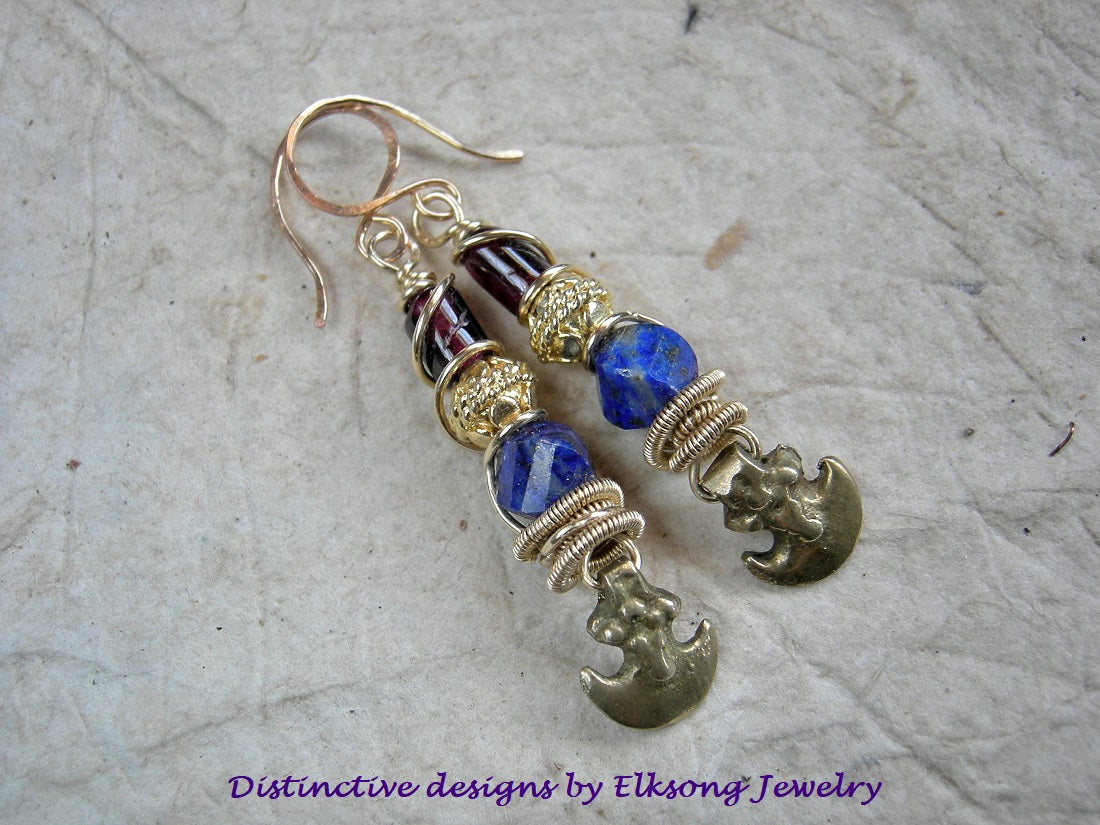 Jewel tone lapis & garnet earrings with 22kt gold-over-copper beads, golden brass wire wrap & vintage ethnic brass crescent charms. 