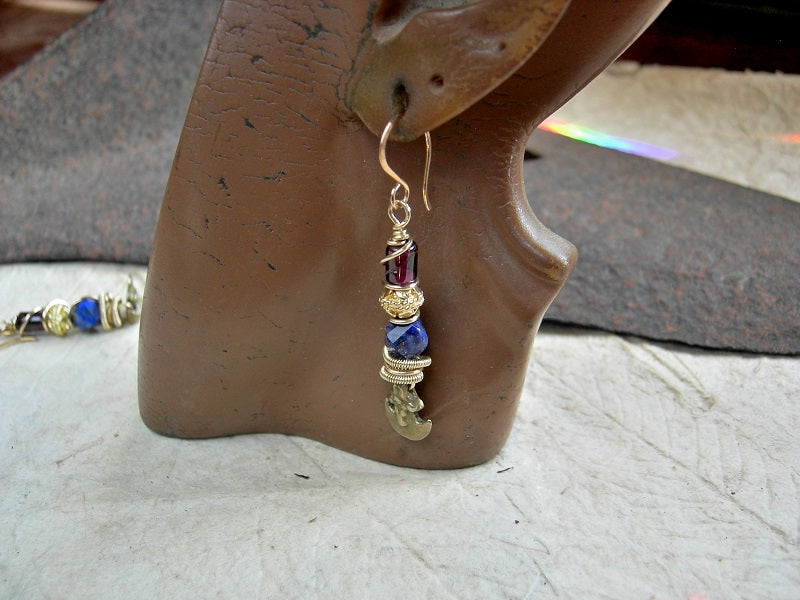 Jewel tone lapis & garnet earrings with 22kt gold-over-copper beads, golden brass wire wrap & vintage ethnic brass crescent charms. 