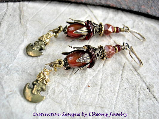 Golden Crescent earrings with carnelian, goldstone, glass flowers, antiqued brass caps & vintage ethnic brass crescent charms. 14kt gold filled ear wires. 