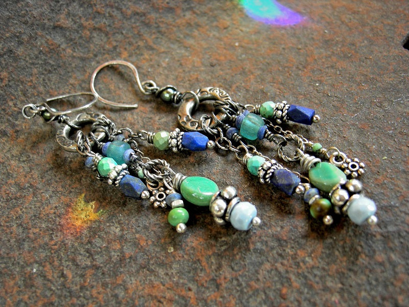 Clustered chandelier style earrings with stamped silver rings, mixed blue gemstone & Bali style sterling-over-copper beads. 