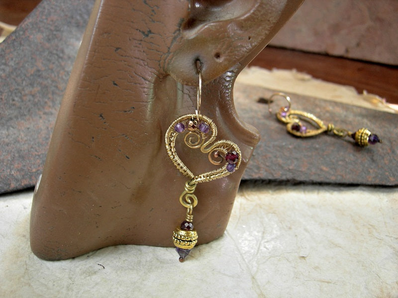 Heart O Gold wire wrap earrings with abstract heart shapes, faceted amethyst, garnet & golden hematite. 14kt gold fill ear wires. 