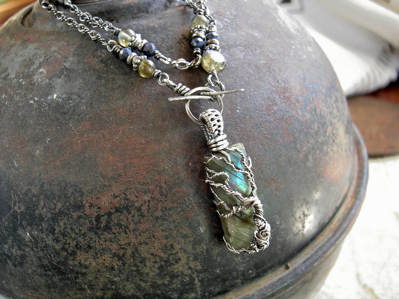 Bead & chain necklace with sterling wire wrap tree on faceted labradorite focal & beads, faceted sapphire beads. 