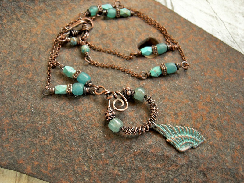 Copper chain & bead necklace with copper wire wrap, glass & copper bead focal, copper verdigris wing charm. Java glass & faceted turquoise beads.