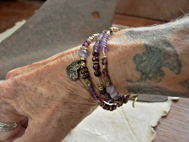 Antiqued brass heart charm wrap bracelet or necklace with strung amethyst, garnet golden hematite, brass & gold beads.