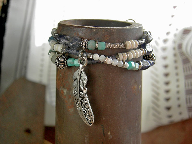 Boho triple wrap bracelet/necklace with blue & white gemstone beads, mother of pearl, sterling-over-copper beads, feather charm & sterling toggle clasp. 