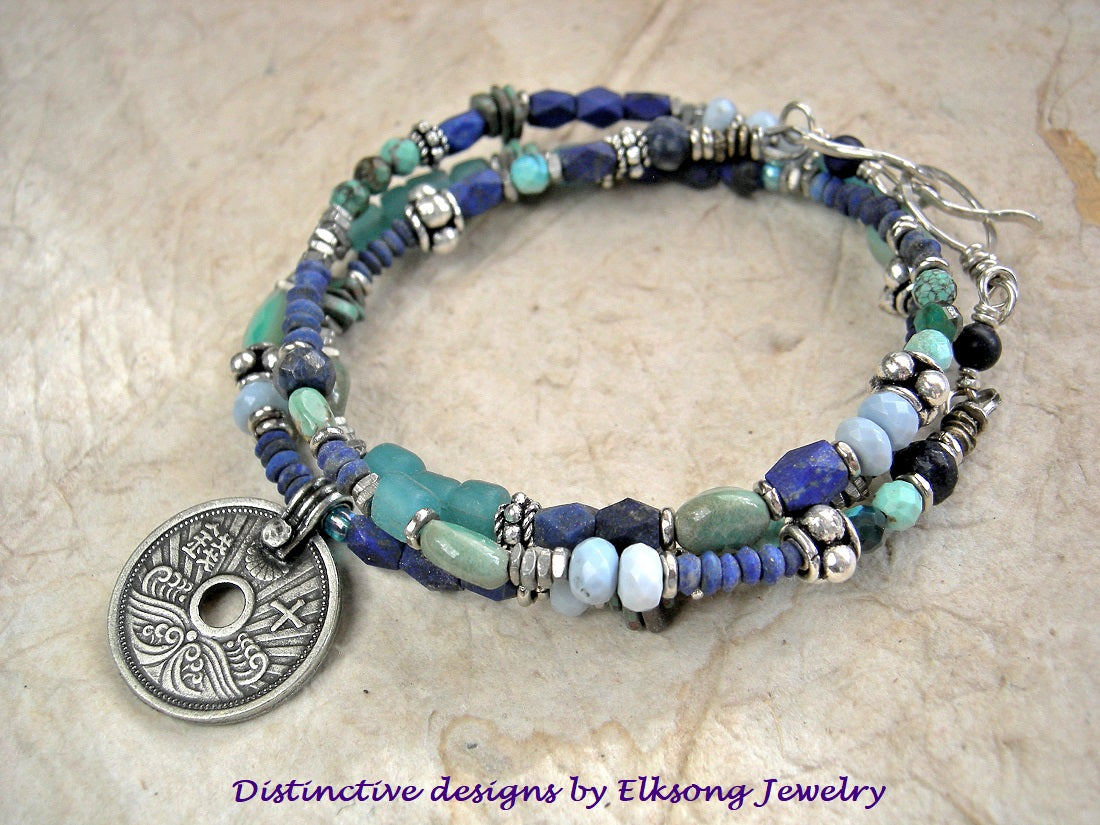 Ocean Blue wrap bracelet with strung lapis, turquoise, chrysoprase, Owyhee blue opal, ceramic, aqua glass & sterling-over-copper beads. Japanese coil focal. 