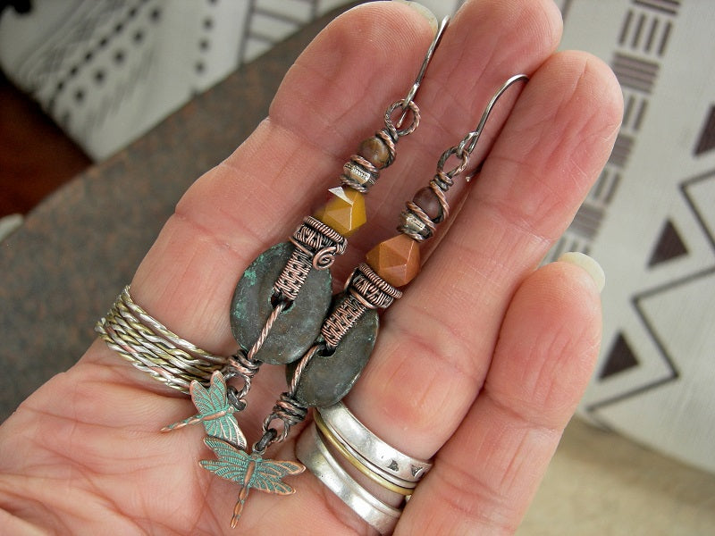 Copper wire wrap earrings with Mykonos ceramic discs, verdigris dragonfly charms, golden mookaite & Red Creek jasper. Sterling ear wires.