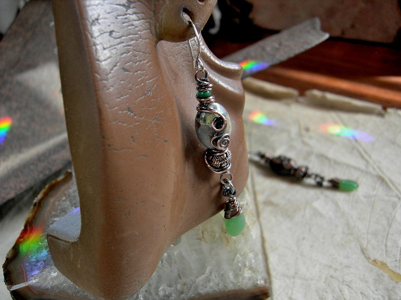 Rainforest earrings with serpentine ovals & oxidized copper wire wrap, malachite, copper beads & jade green glass tear drops. 