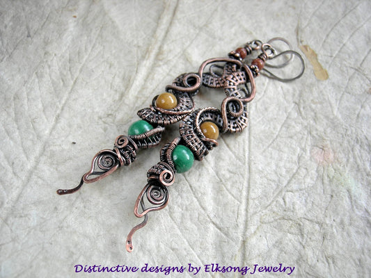 Copper wire wrap Dragontail earrings with malachite, golden jade & goldstone rounds. Handmade sterling ear wires. 