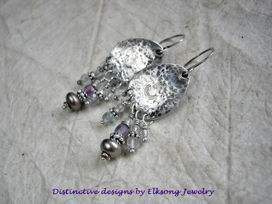Frothy chandelier style earrings with handmade textured sterling tear drop shapes, crystal, fluorite & colored button pearl beads. 