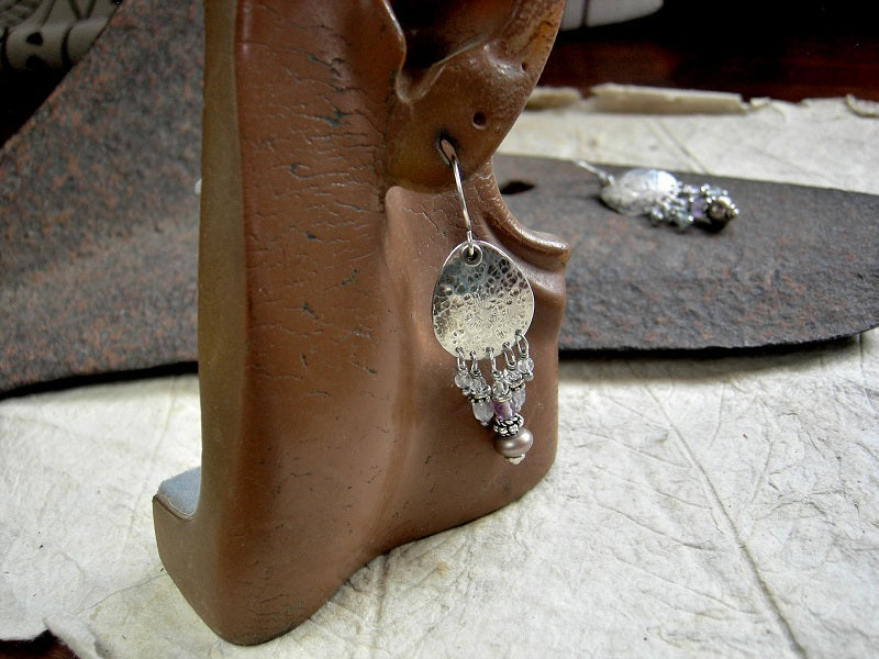 Effervescent chandelier style earrings with handmade textured sterling tear drop shapes, crystal, fluorite & colored button pearl beads. 