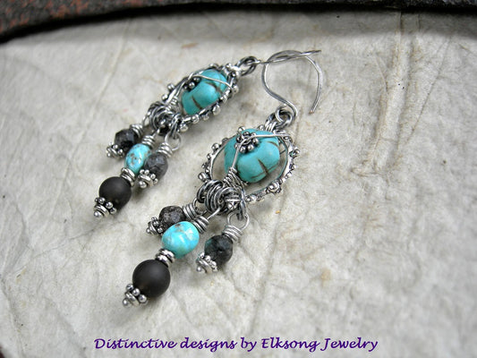 Grounded turquoise & smoky quartz chandelier style earrings, sterling wire wrap, silver finish granulation rings. 