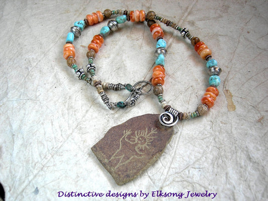Petroglyph necklace with artisan made ceramic focal, strung turquoise, spiny oyster shell, picture jasper & sterling silver beads. 