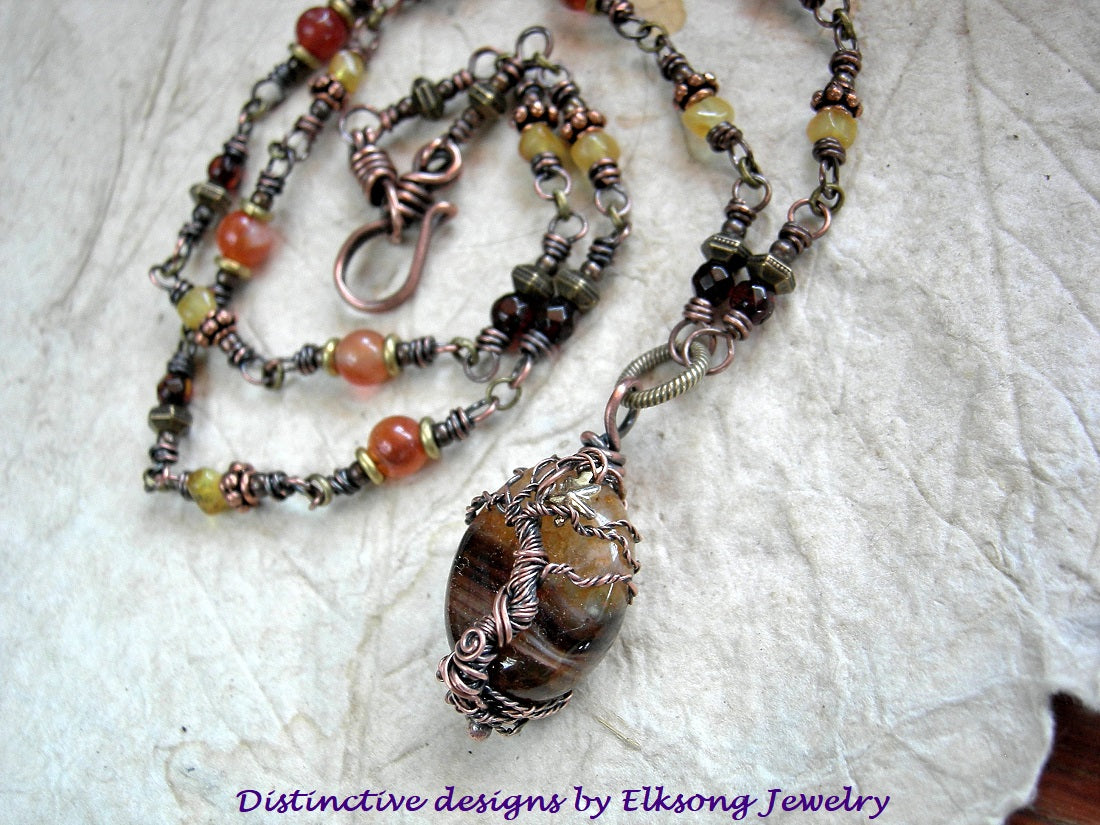 Evening Star copper tree wrap necklace with wire wrap links, copper & antiqued brass beads, amber nuggets & faceted rounds & carnelian. 