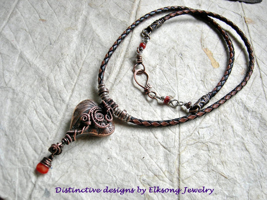 Simple boho necklace with copper Thai style heart & copper wire wrap focal, red coral & spiny oyster shell beads and leather bolo cord. 