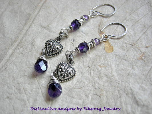 Silver heart earrings with purple amethyst beads, silver finish bead caps, steel chain & sterling ear wires.