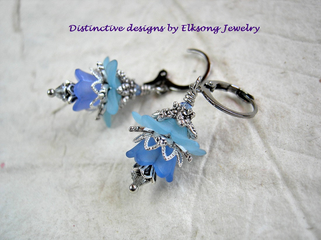 Sky blue flower earrings with resin flowers, silvery filigree & crystal. Vintage style faery couture earrings. 