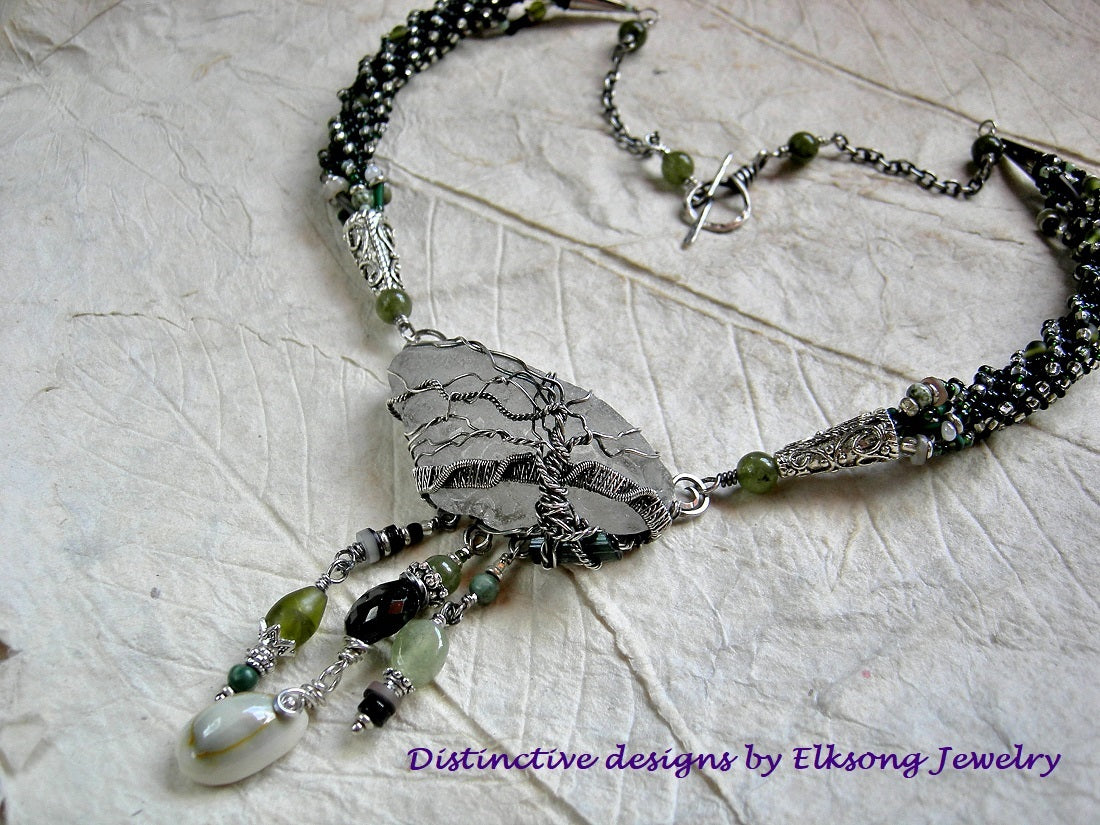 Sterling wire wrap tree necklace with woven seed beads, genuine sea glass & green gemstone beads.